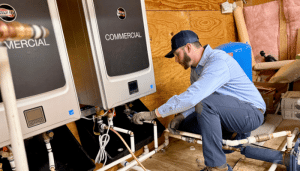 Jackson & Sons Technician Performing Water Heater Replacement